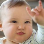 An Adorable Cute Little Kid Show His Hand - Baby Sign language.
