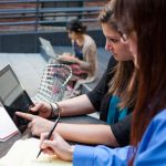 Group Of Students Studying About Sign Language Via Tablet.