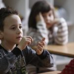 Cute Little Boy Making Hand Gesture Sign In His Sign language Session.