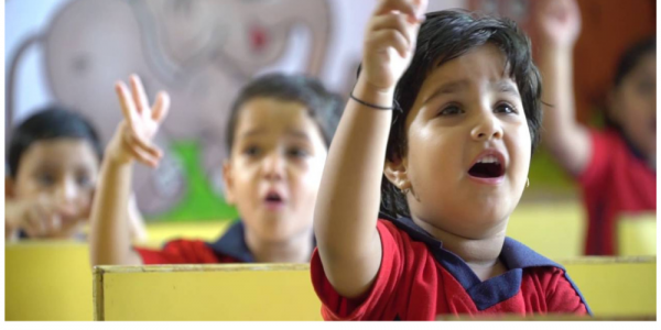 School Kids Speaking By Using Sign Language.