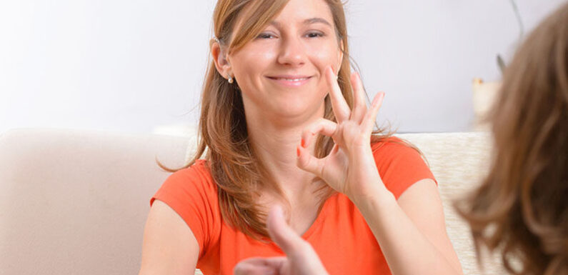 Learning sign language.